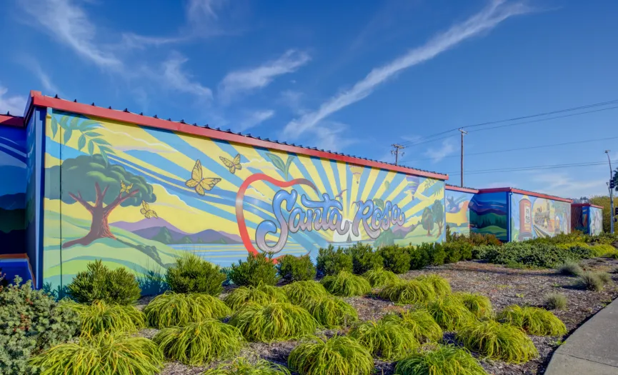 Santa Rosa mural with rolling hills, butterflies, and local scenery near Security Public Storage on Hopper Ave in Santa Rosa, CA