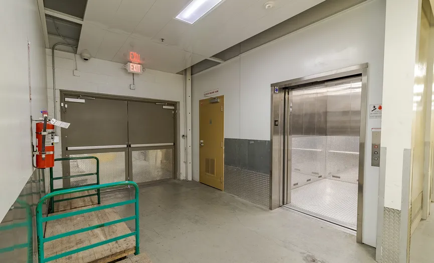 Moving carts next to an elevator at Security Public Storage in San Ramon for easy access to storage units