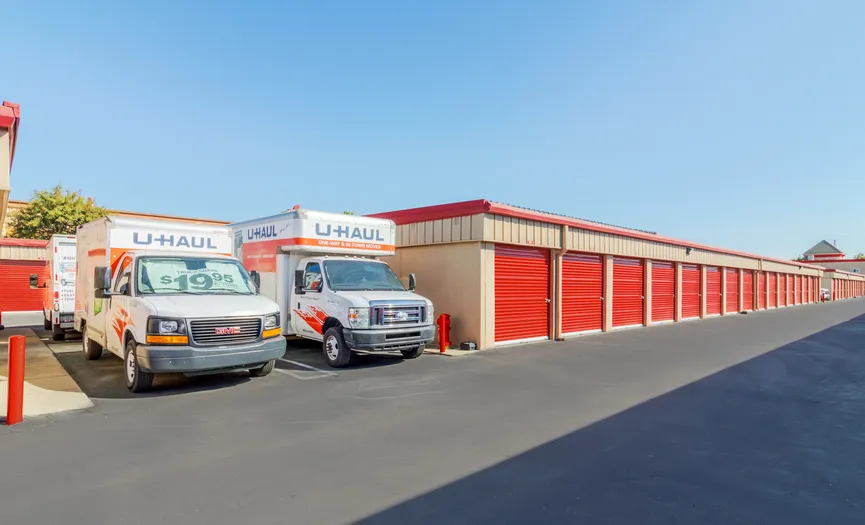 Moving trucks parked outside and available for customer use at our North Modesto facility