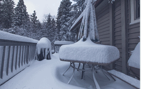 Patio furniture in the snow