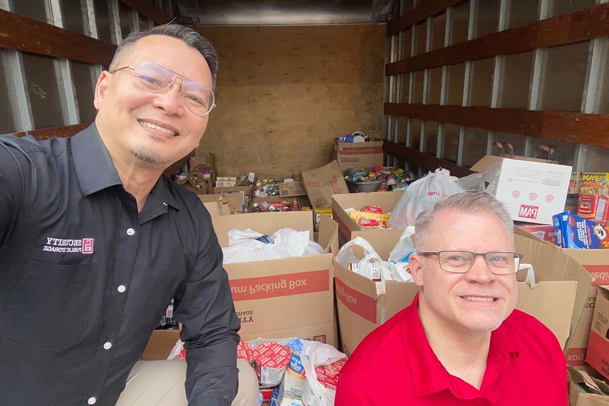 Barry and Tyler in food donation truck