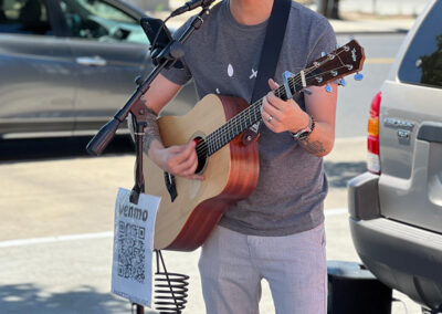 guitarist/singer performing at SPS 40th anniversary party